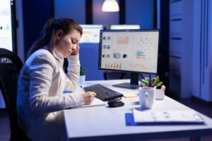 woman working at night in front of computer Collect Comprehensive Data